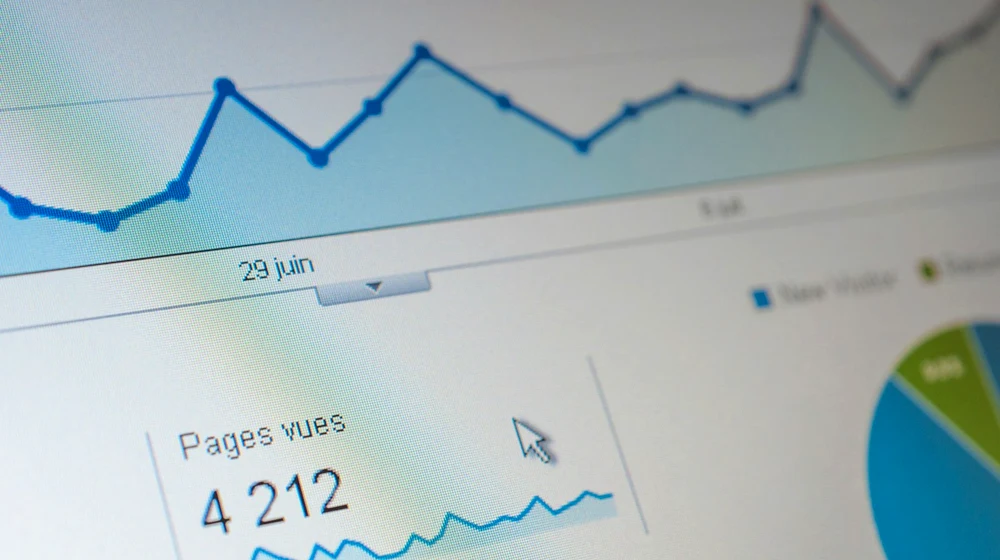 Close-up of a real website traffic line graph on screen, thumbnail for the job board Google spam update recovery case study